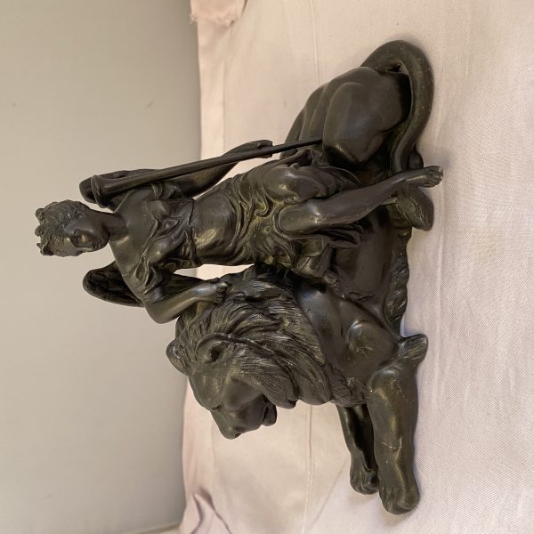 Victorian spelter angel sitting on lion (1318)