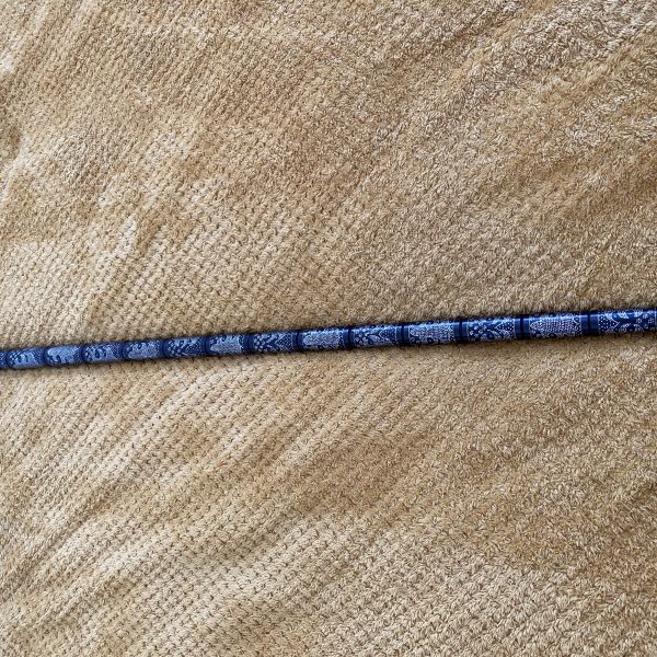 A heavily decorated walking stick (1246)