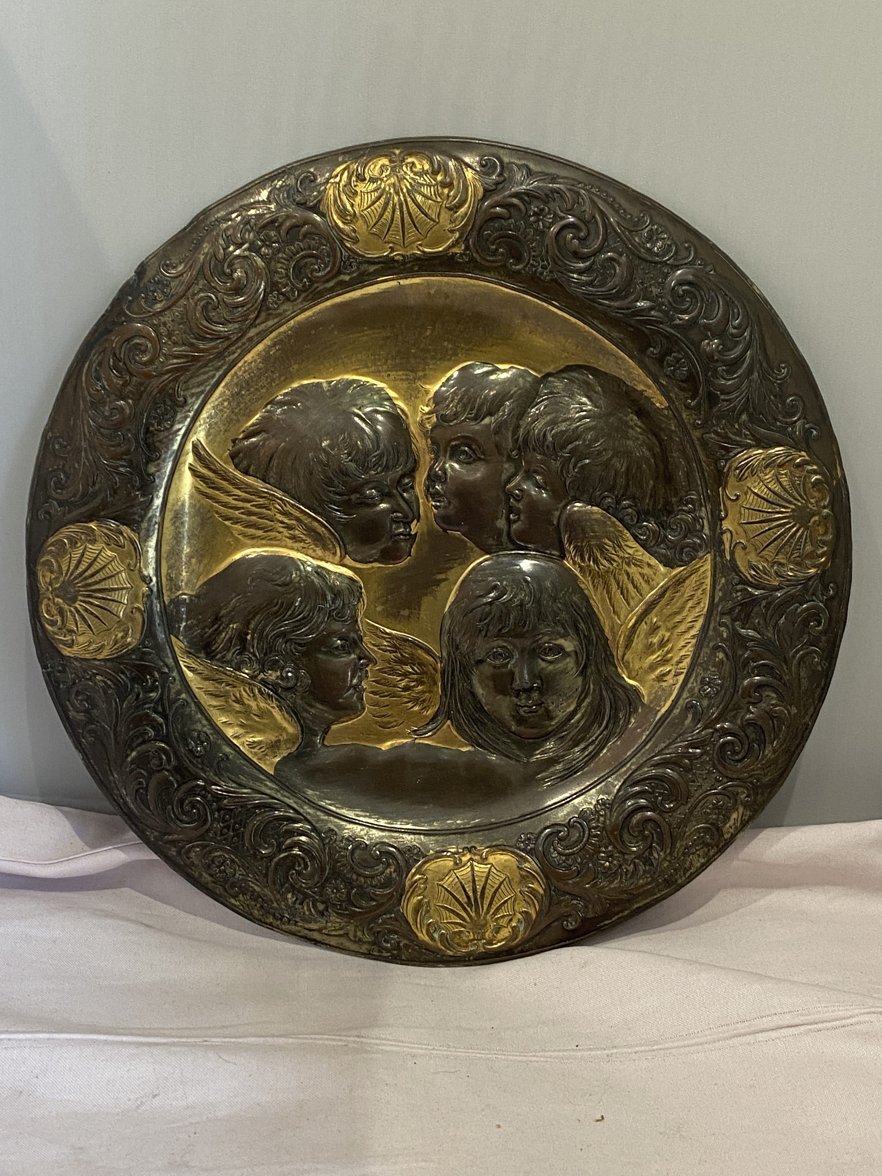 Vintage repoussé plaque of four winged angels (1255)